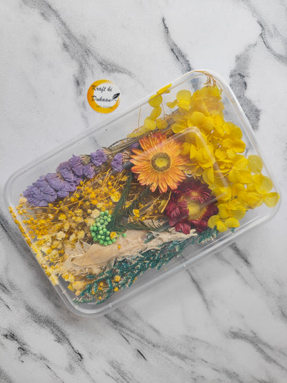 Kraft ki Dukaan dry flower box for resin art featuring vibrant yellow and purple flowers