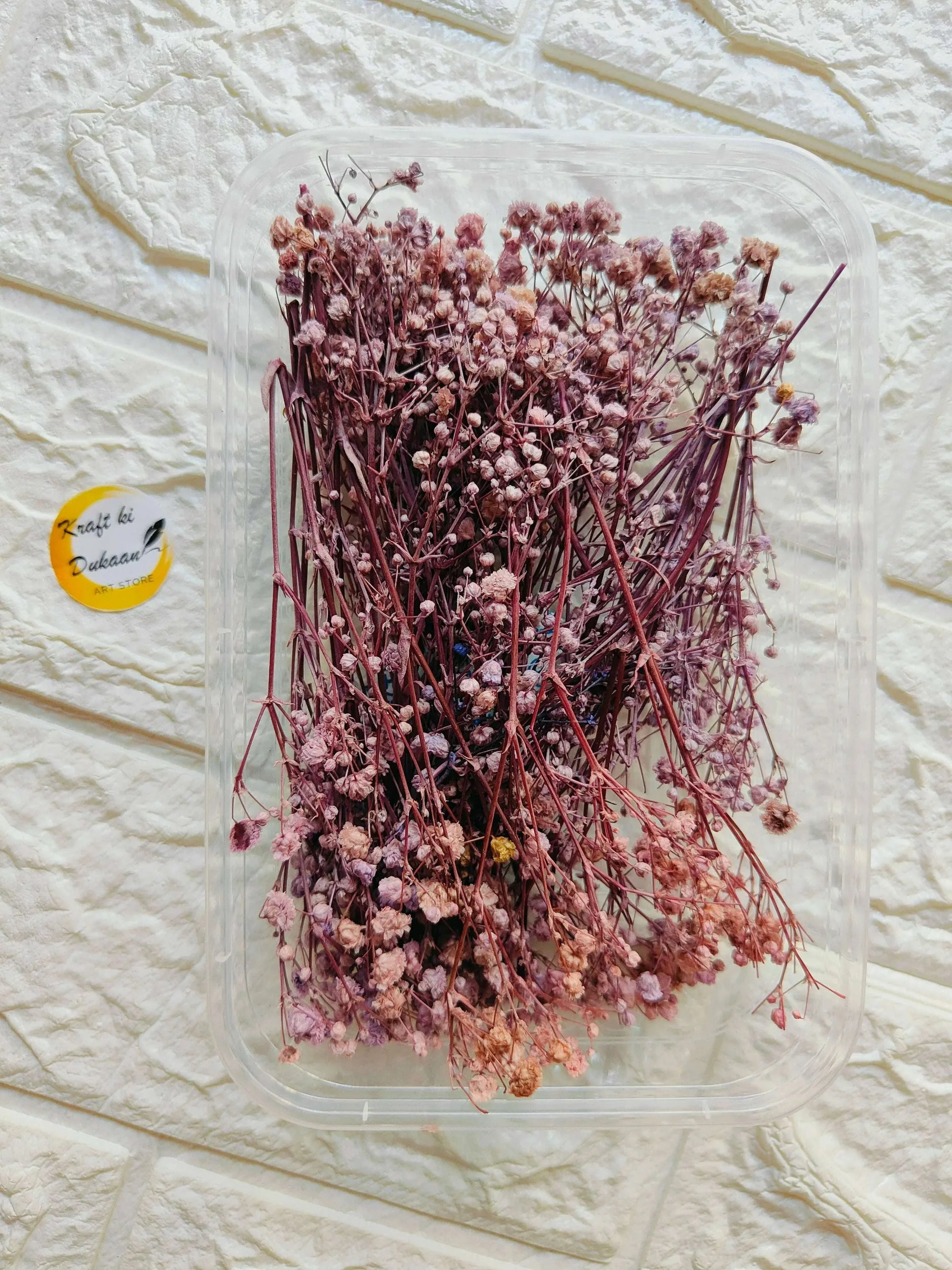 Dry Flower Box D2 with dense dried pink-purple blossoms in a clear square box