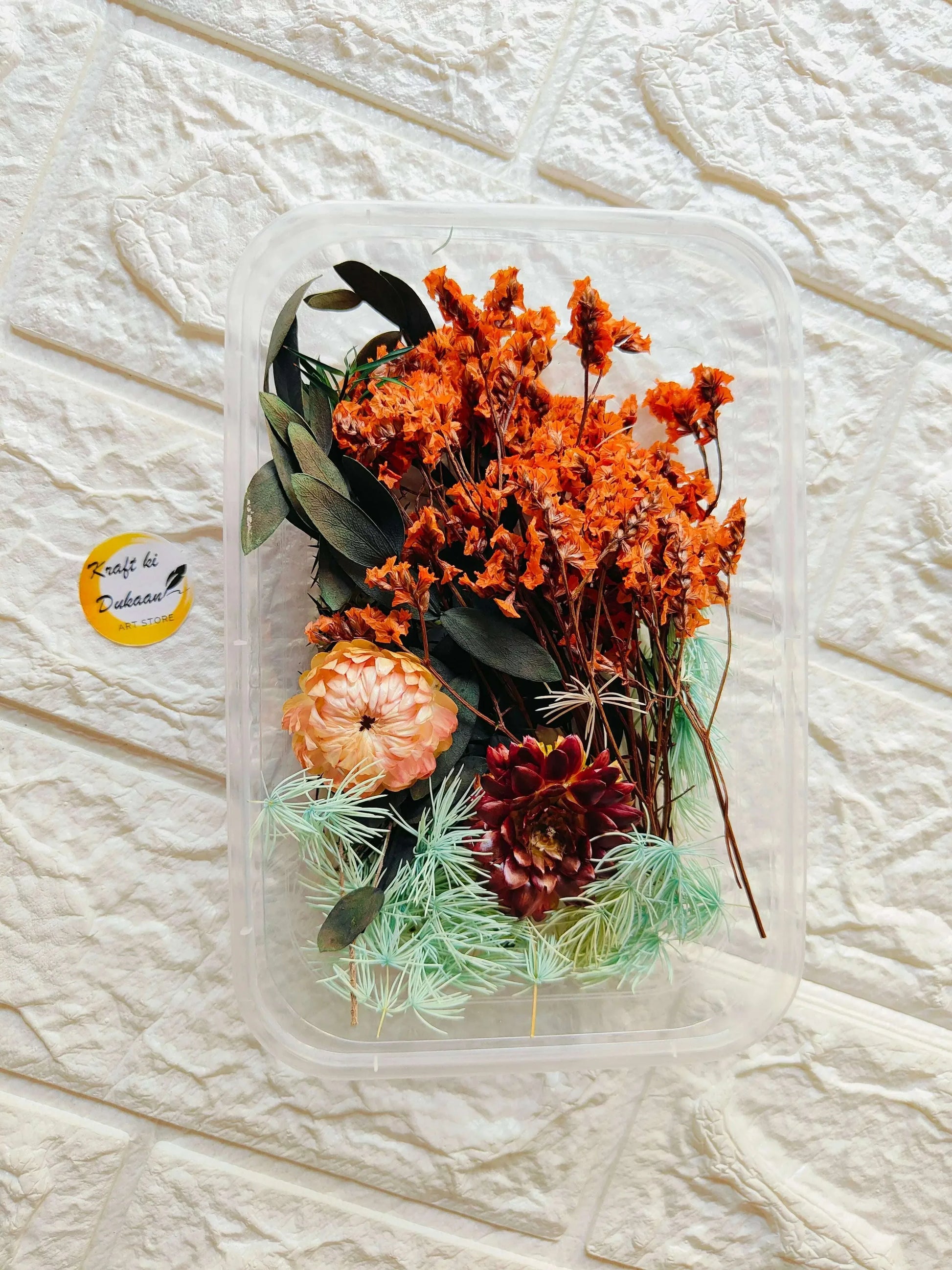 Dry Flower Box C12, transparent case with orange blooms, dark maroon petals, green accents