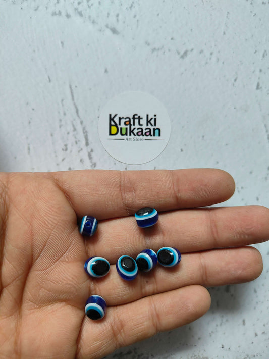 8x10 oval evil eye beads, blue with dark centers, pack of 25
