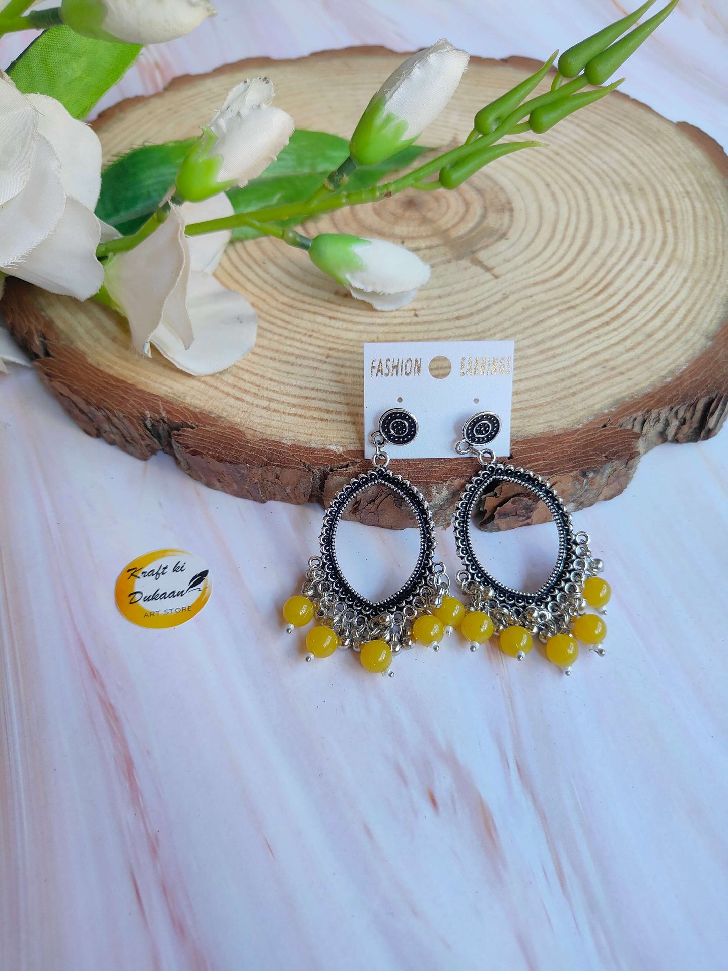 fashion-silver-jhumka-earrings-with-beads-yellow-accent
