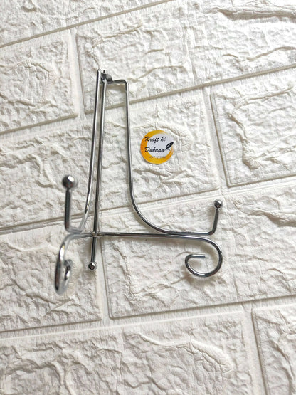 Foldable silver metal stand with side arm and hanging hook
