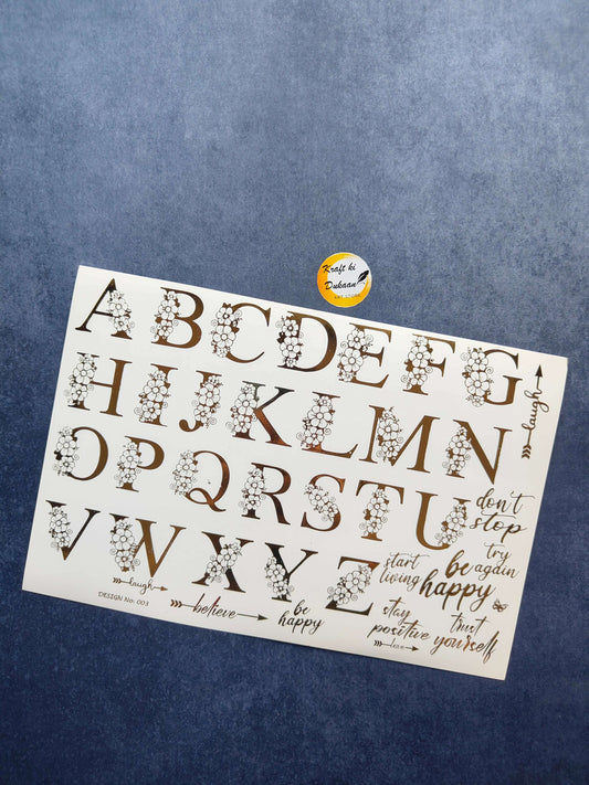 Gold alphabet sticker sheet featuring stylish letters and motivational phrases for crafts and decor