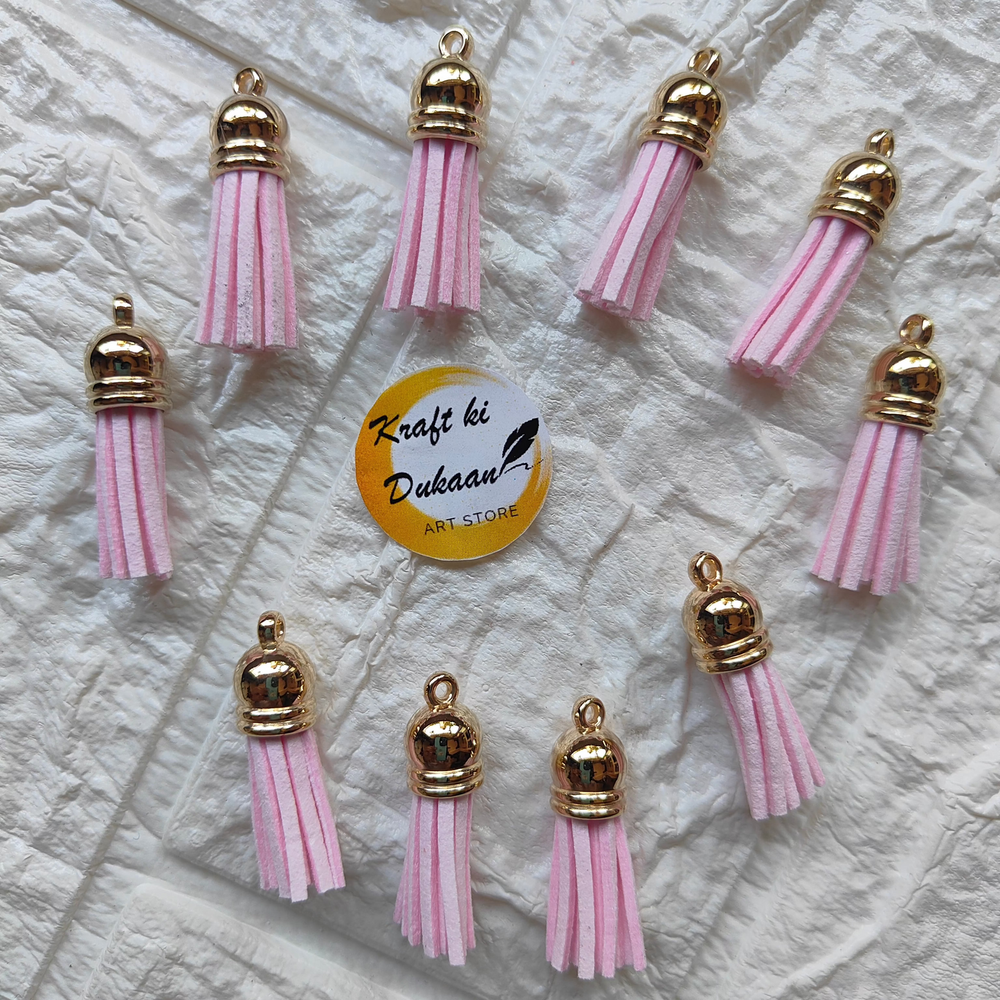 Gold Leather Tassel Craft in pink with gold accents, perfect for DIY projects and decorations