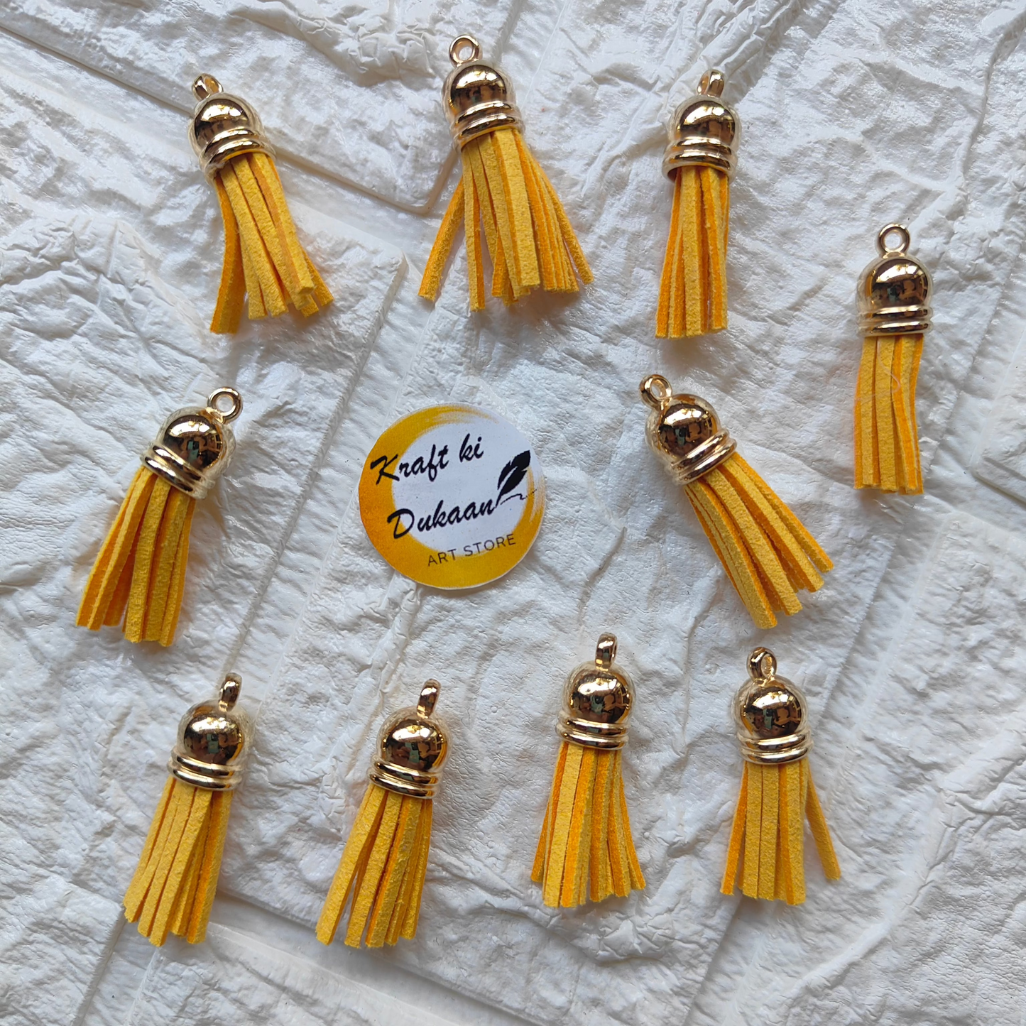 Gold Leather Tassel Craft in Vibrant Yellow with Metallic Caps for DIY Projects and Accessories
