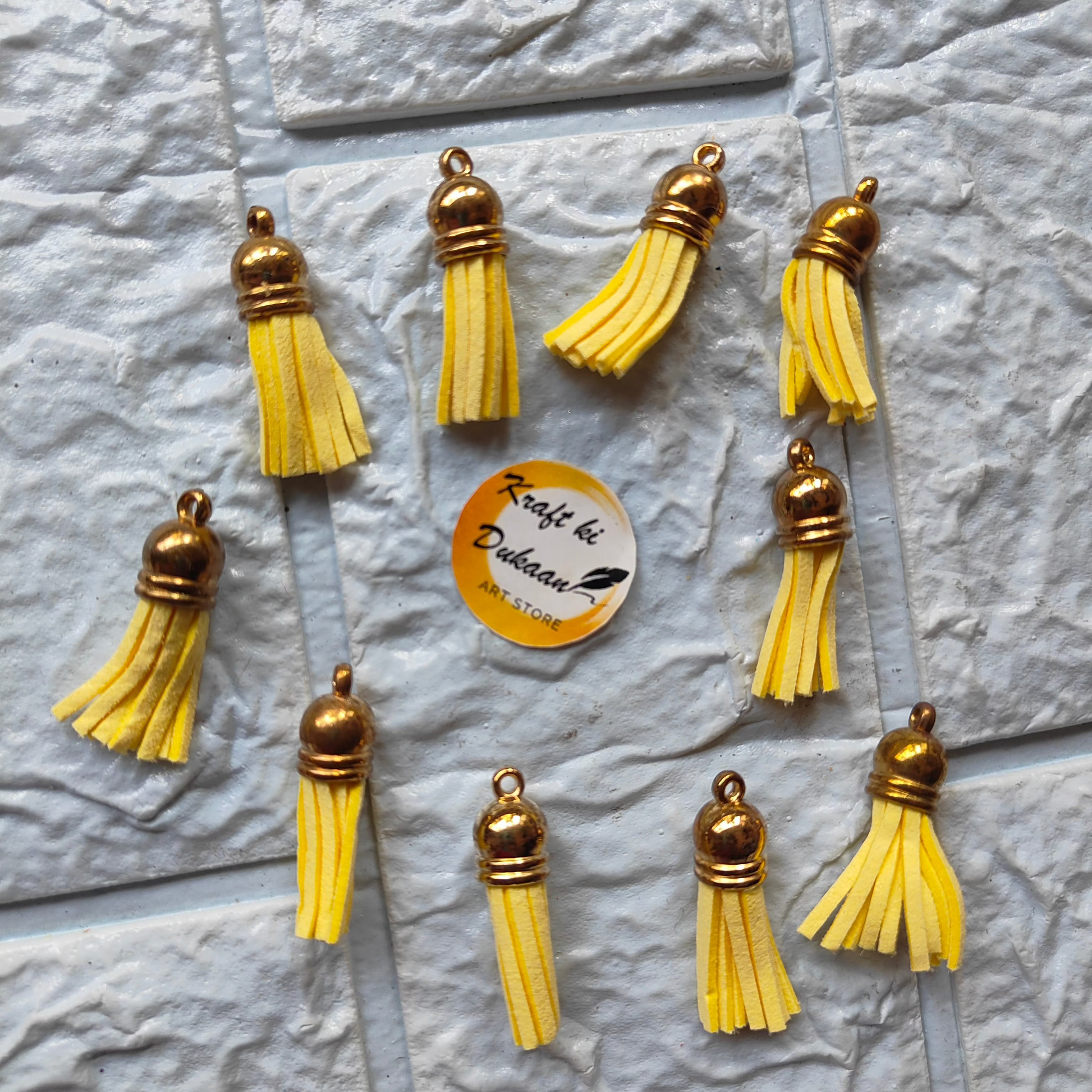 Handcrafted Gold Leather Tassel Craft in vibrant yellow, perfect for DIY projects and accessories