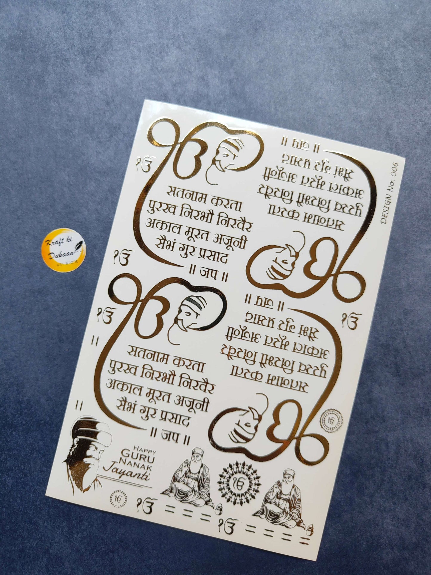 Gold metal sticker sheet for crafts featuring decorative designs and spiritual symbols