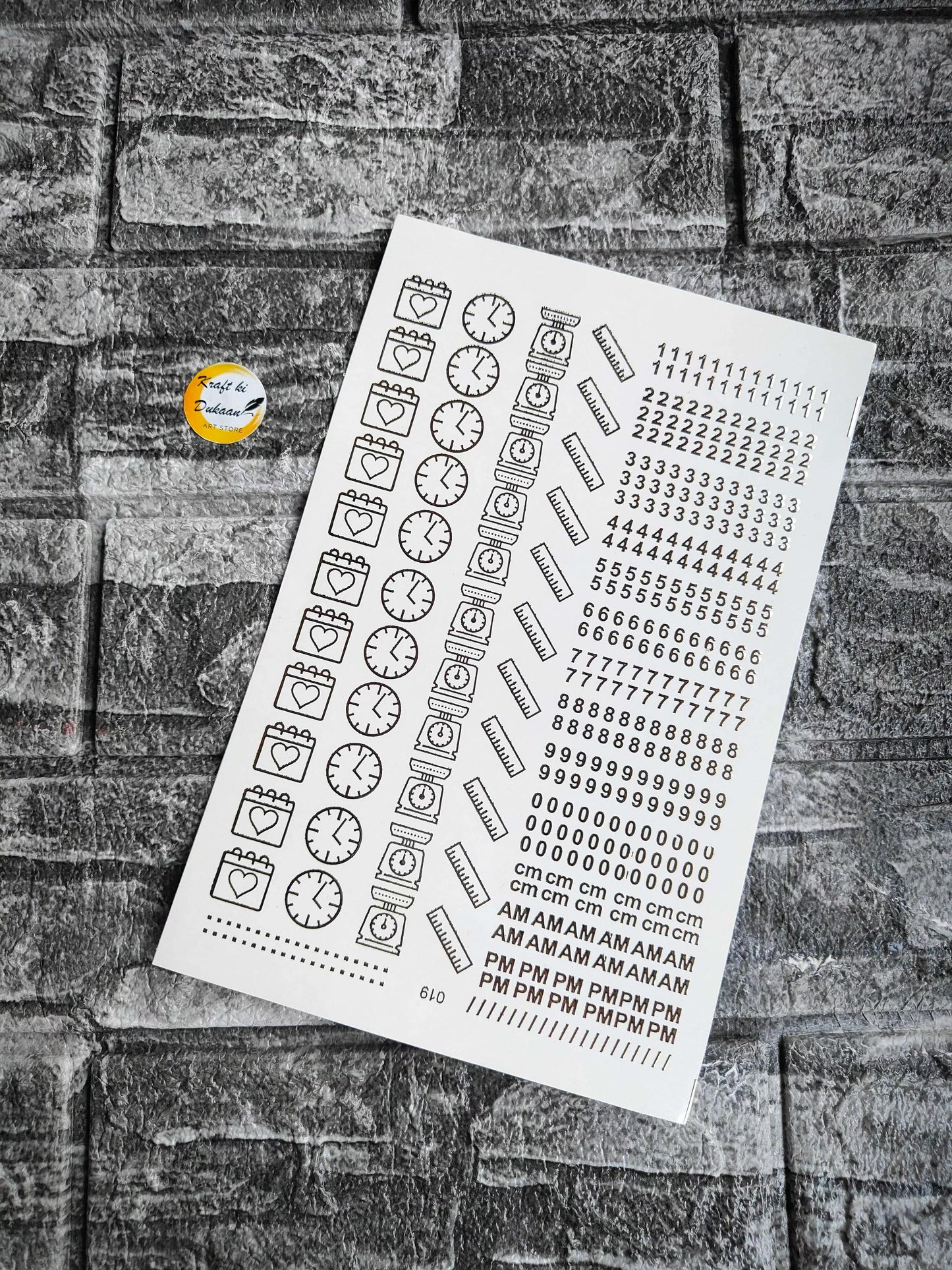 A5 gold embossed sticker sheet: clocks, hearts, rulers, numbers, cm scale