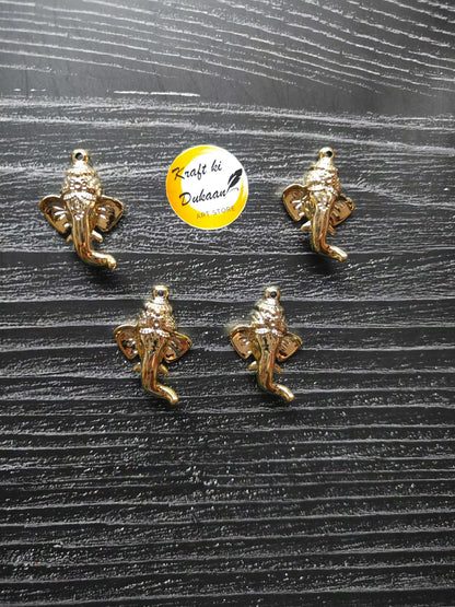 golden-ganpati-face-charms-flat-arrangement-group