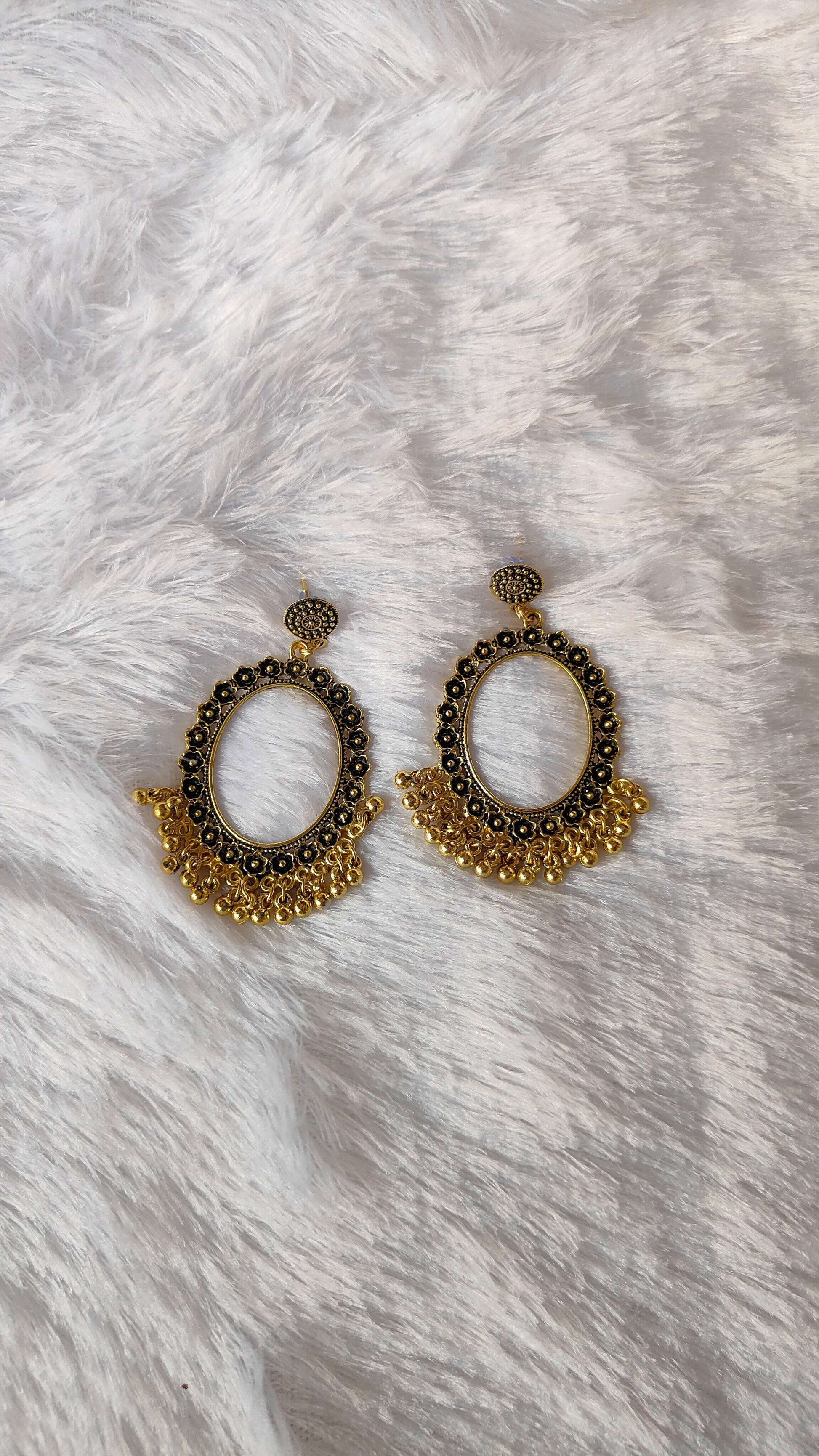 golden-jhumka-earrings-oval-black-gold-beaded-design