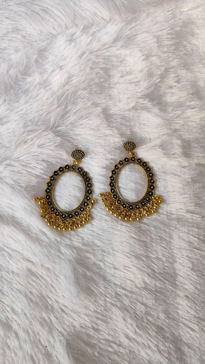 golden-jhumka-earrings-oval-black-gold-beaded-design