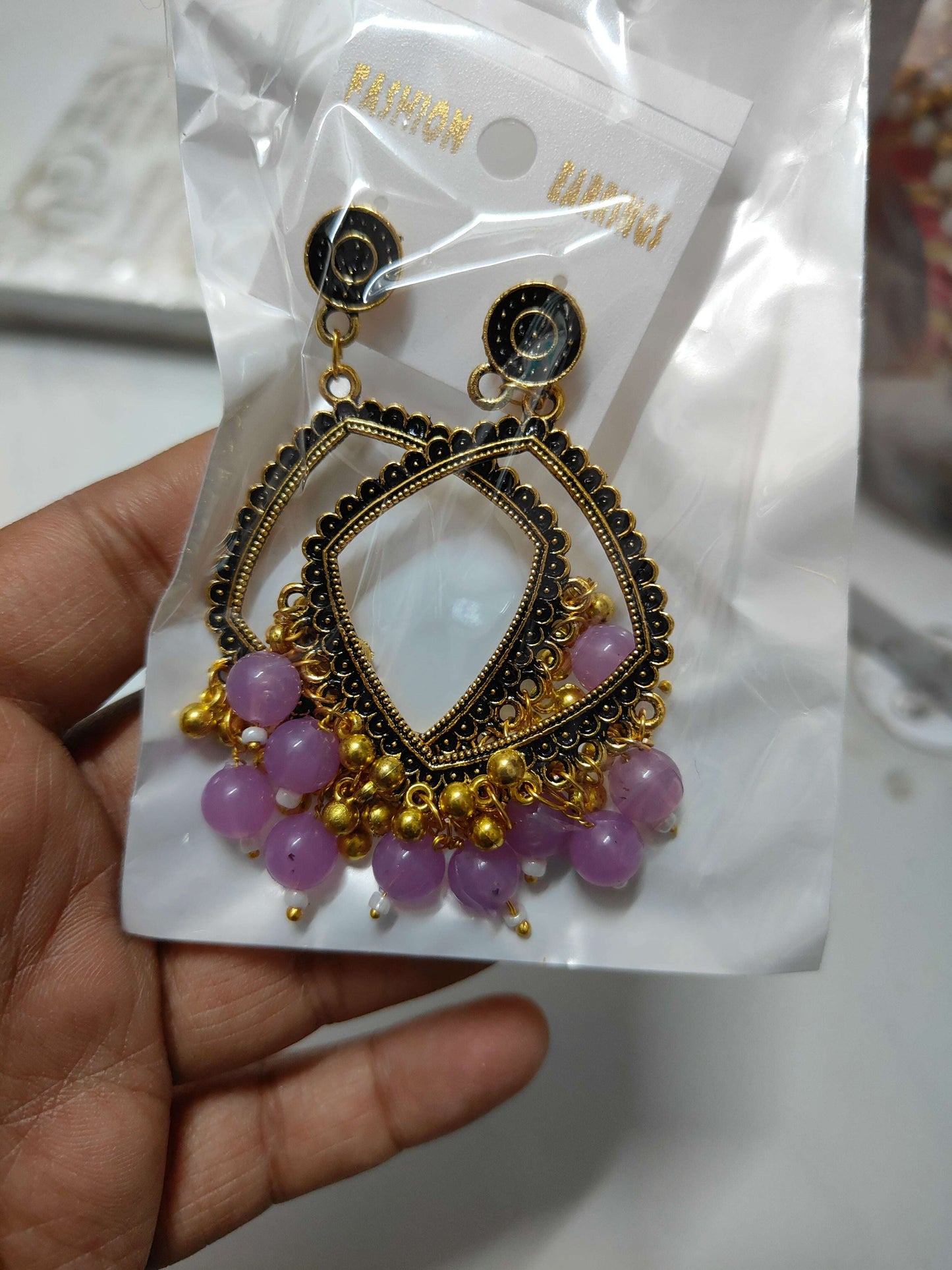 golden-jhumka-earrings-with-beads-purple