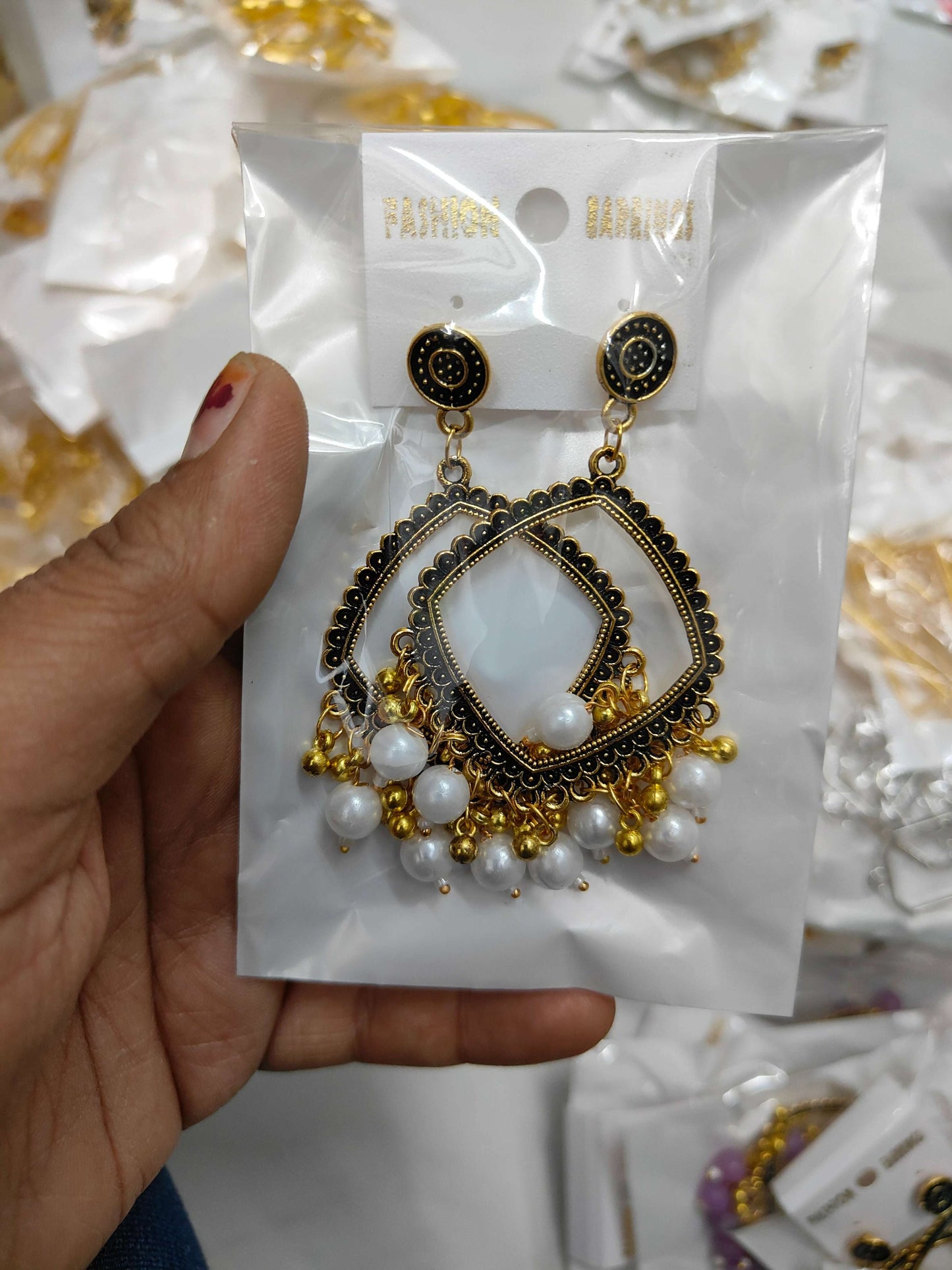 golden-jhumka-earrings-with-beads-white