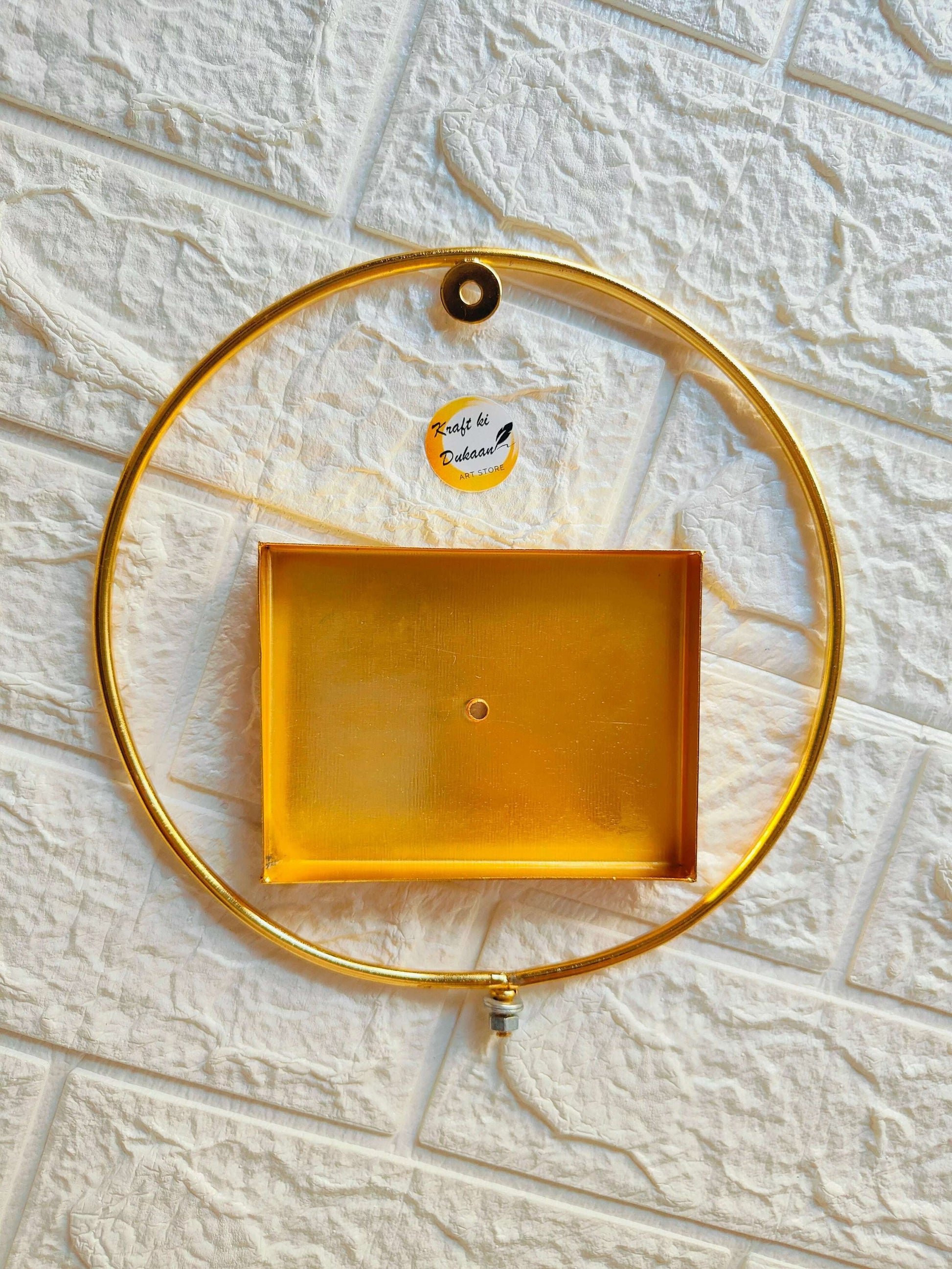 golden-metal-loop-stand-with-box-in-center