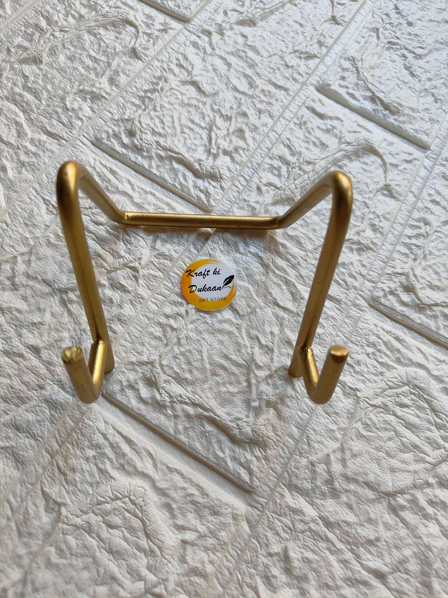 golden-metal-stand-for-art-display-angle-2