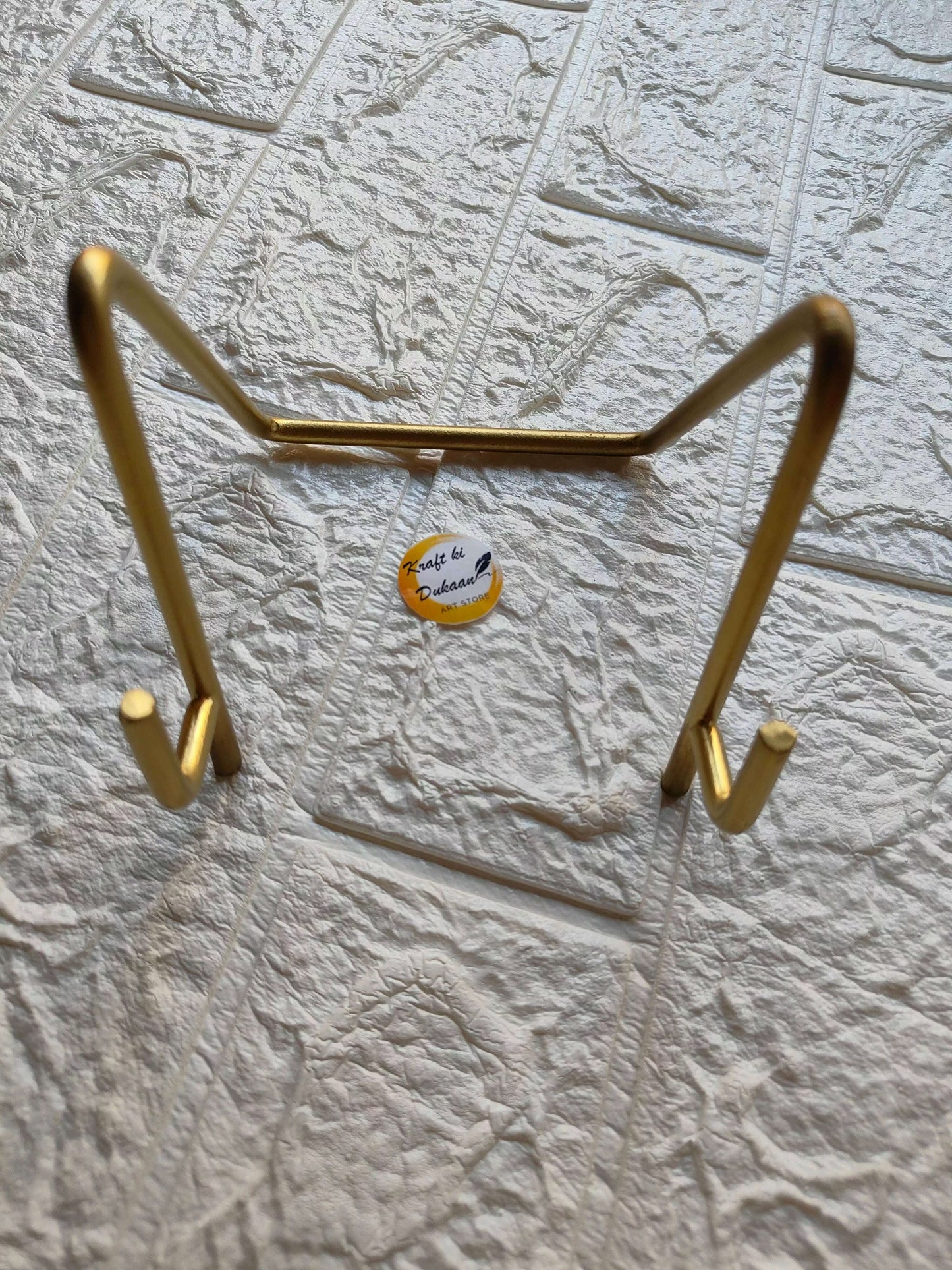 golden-metal-stand-for-art-display-angle-3