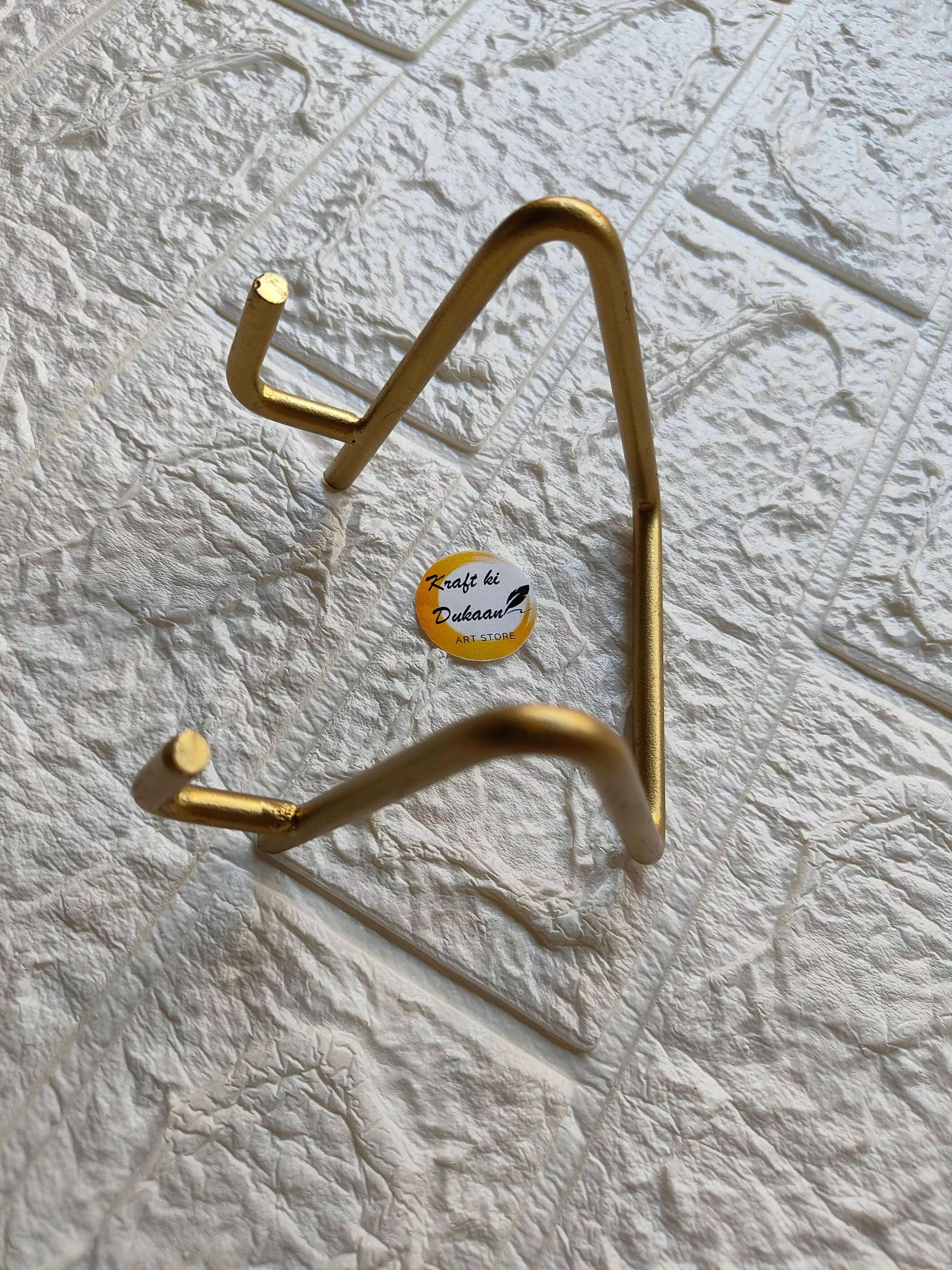 golden-metal-stand-for-art-display-angle-4
