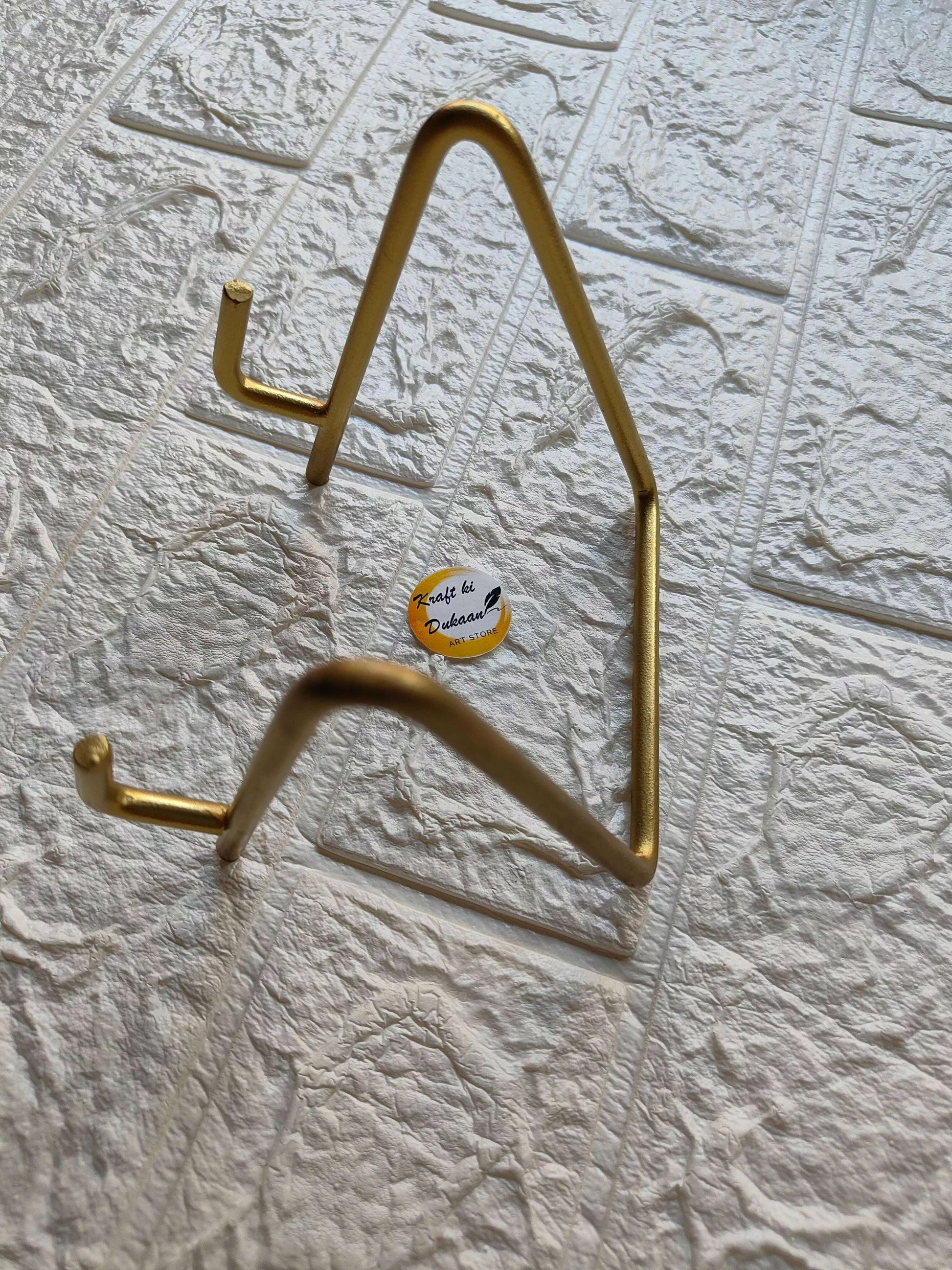 golden-metal-stand-for-art-display-angle-5