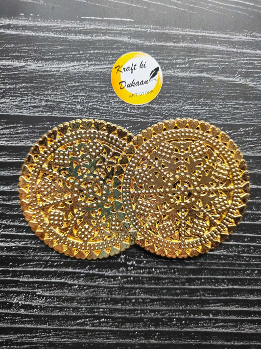 Golden round t-light plates with ornate rhinestone filigree; two pieces