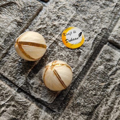 Gota Patti craft balls in cream and gold design, perfect for decorating and crafting
