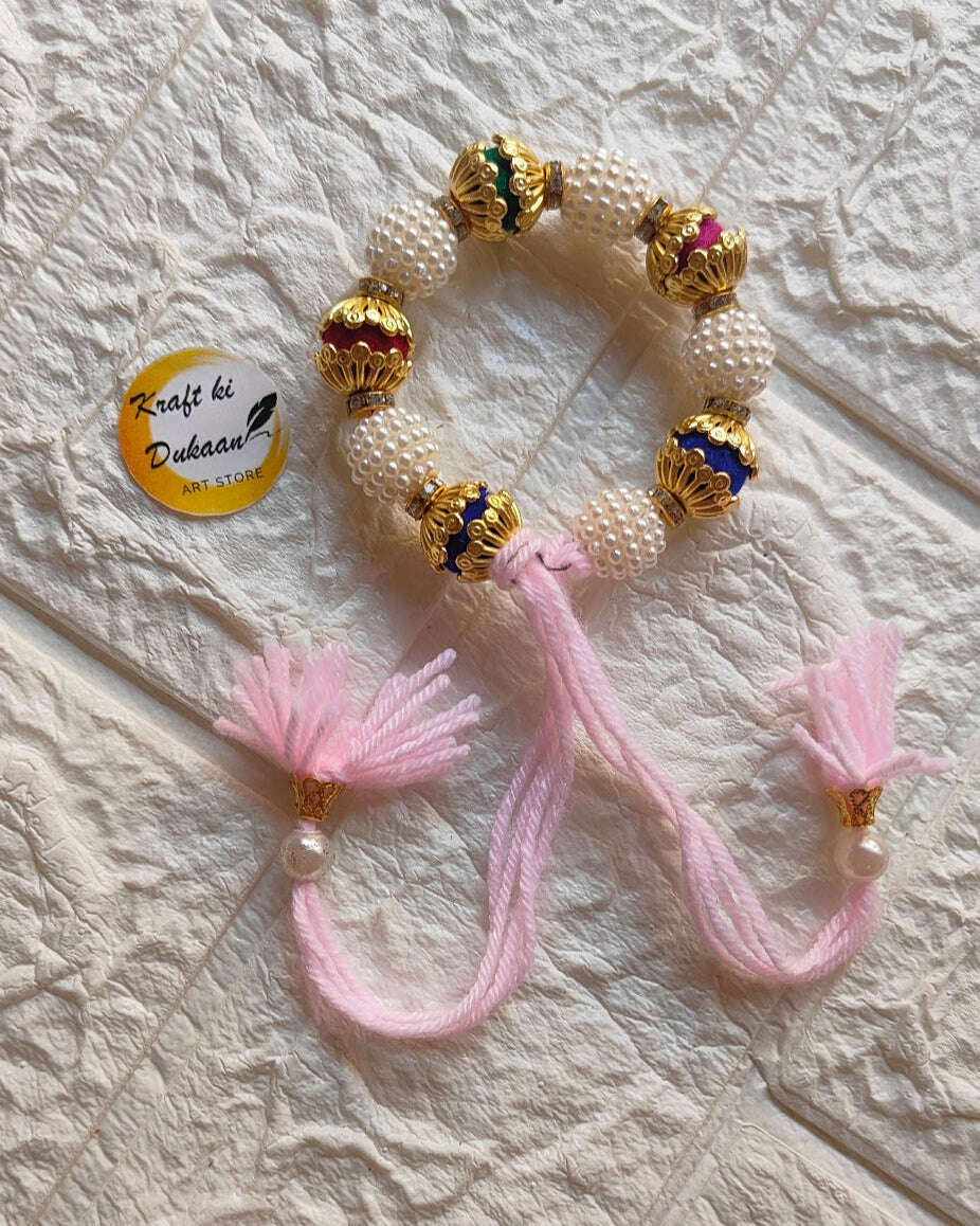 handmade-beaded-bracelet-gold-pearls-pink-tassels-2