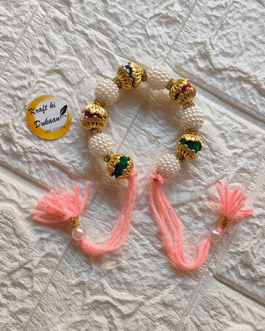 handmade-beaded-bracelet-gold-pearls-pink-tassels