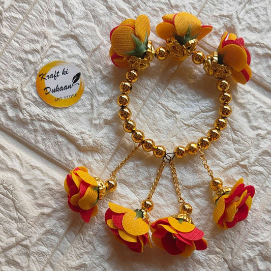 handmade-floral-bracelet-yellow-red-flowers-gold-beads