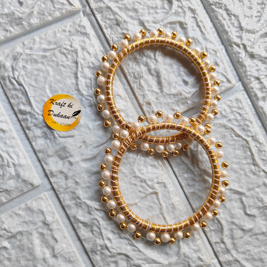 Handmade gota ring pair with gold beads and pearl embellishments from Kraft ki Dukaan