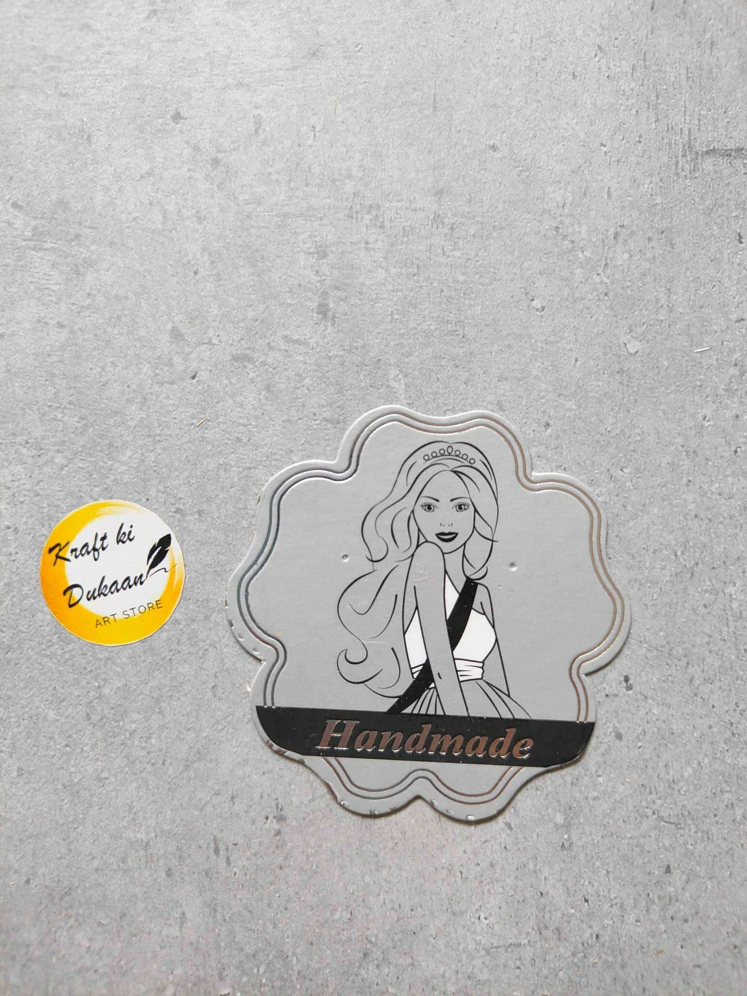 Jewellery Card A16 with illustrated woman and 'Handmade' text, gray scalloped frame