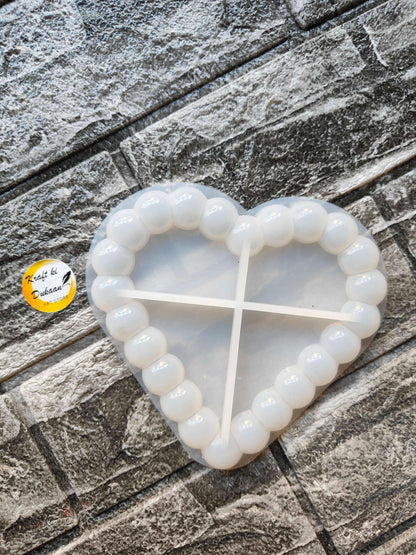 Heart bubble dish mould, white flexible tray with bubble rim and grid center.