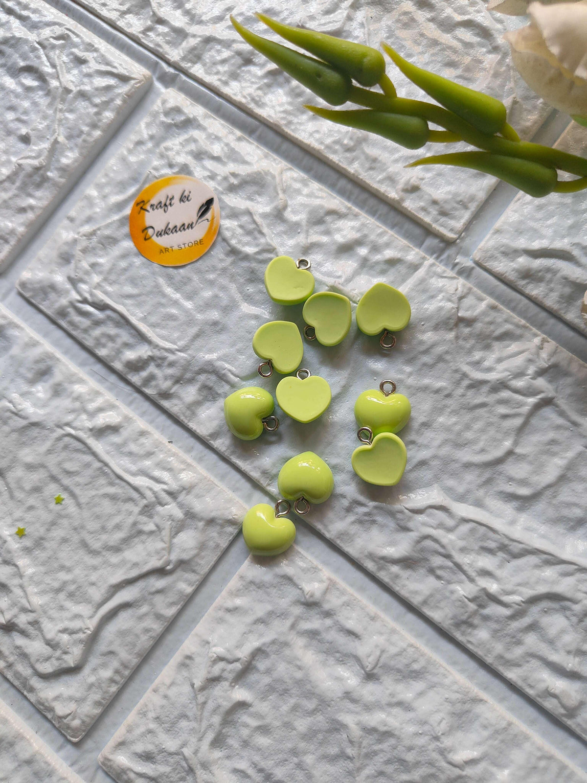 Heart charm pendants set: 10 green hearts with metal loops