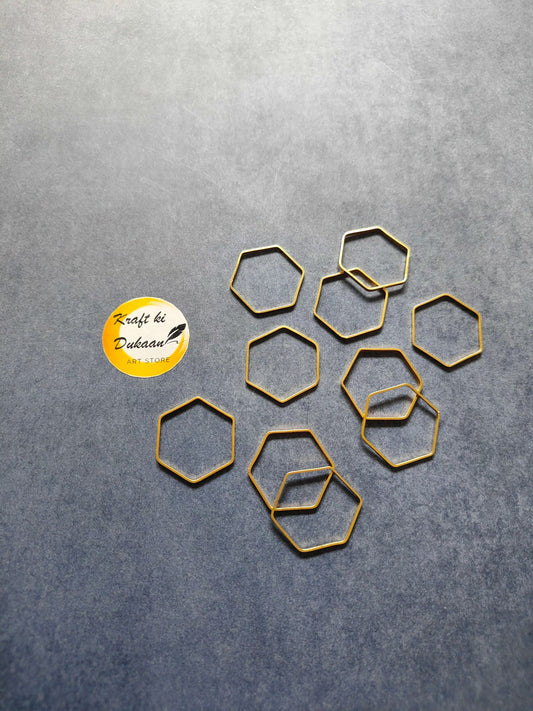 Hexagon bezel 10-piece set of gold-tone hexagon frames, flat-backed.