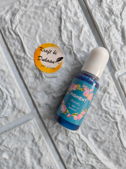 High-quality resin pigment in blue bottle with floral design from Kraft ki Dukaan for crafting projects