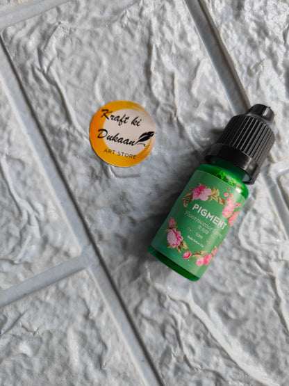 High-quality resin pigment bottle in green with floral design for vibrant art projects