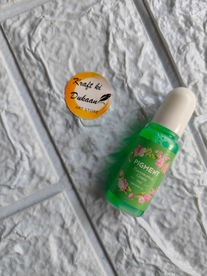 Kraft ki Dukaan high-quality resin pigment in floral green packaging on a textured surface