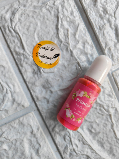 Kraft ki Dukaan high-quality resin pigment in a pink bottle on textured surface