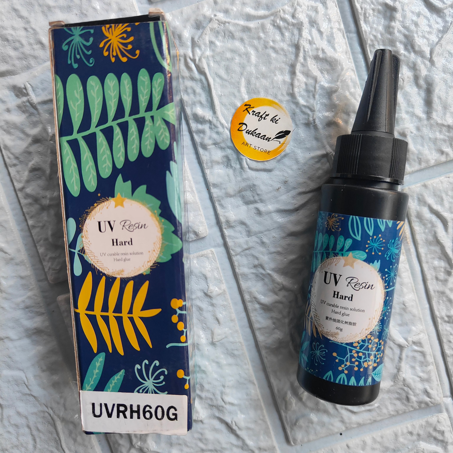 Kraft ki Dukaan high-quality UV resin in a 60g bottle with colorful botanical design for crafting projects
