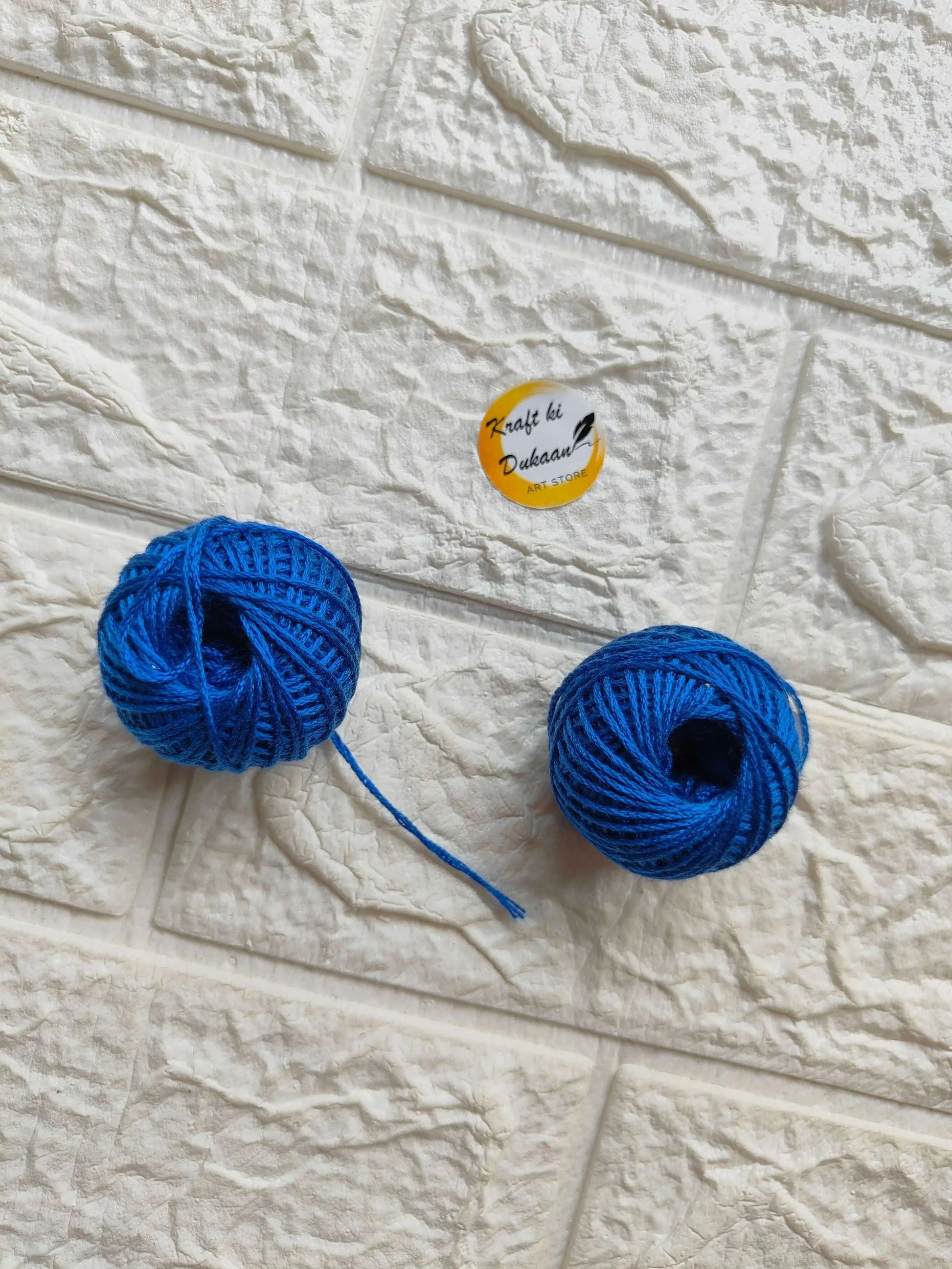 Rakhi thread roll set, royal blue yarn balls with loose thread ends