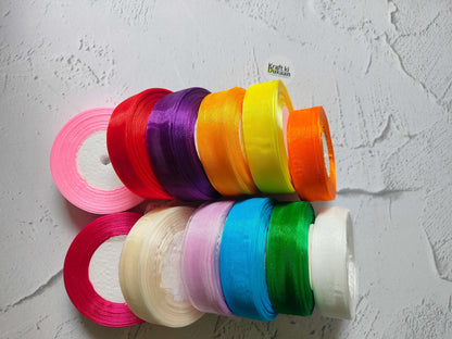 Assorted-color organza ribbon spools set, narrow sheer ribbons on display.