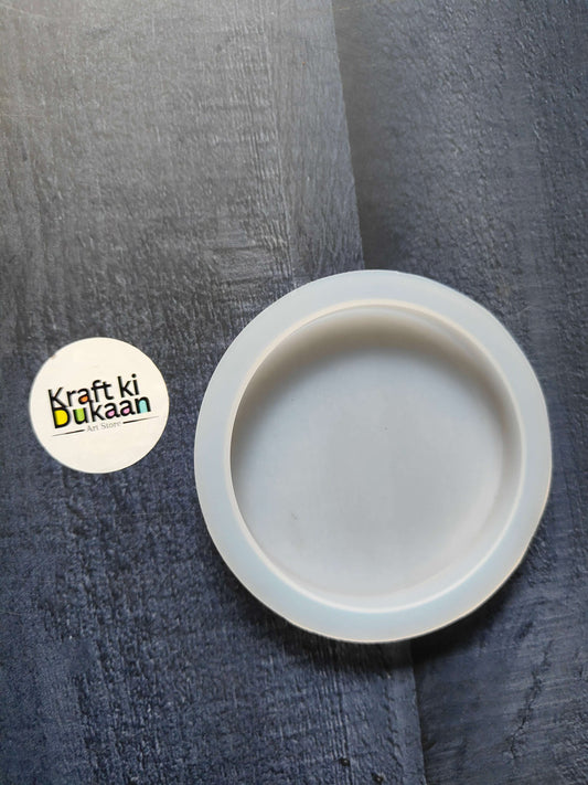 4-inch plain round edge mould, white circular rim viewed from above.