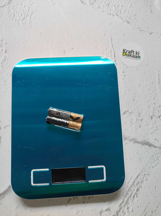 Teal digital weighing scale with LCD display and indicator buttons