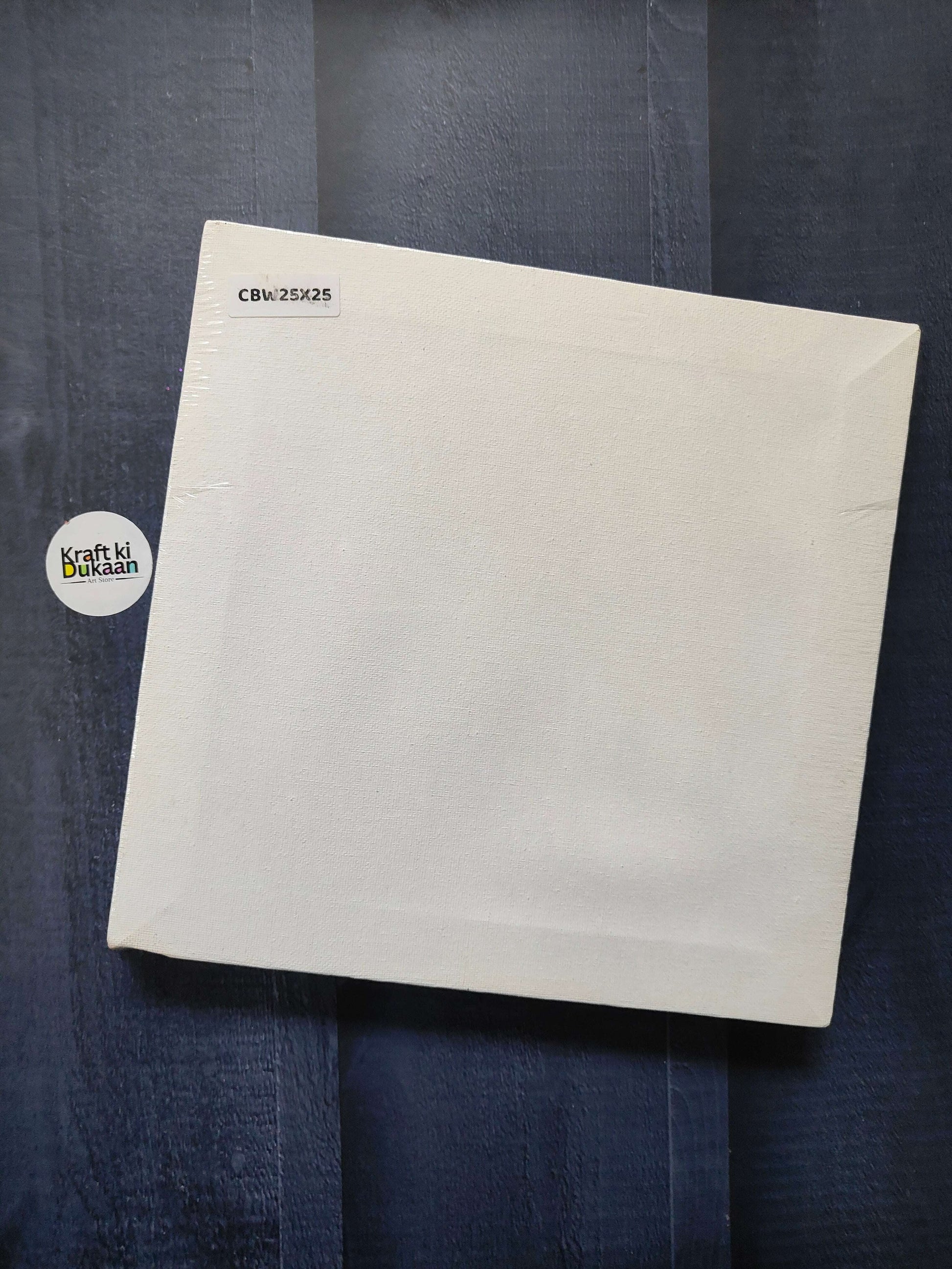 Square stretched canvas board with white canvas and frame edges, 25x25 cm