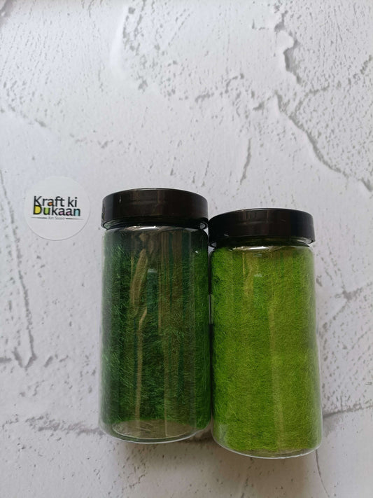 Artificial Grass 40GM: dark green and light green fiber jars, each in a clear container