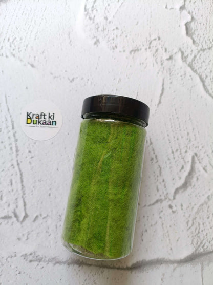 Artificial Grass 40GM light green artificial grass fibers in a clear jar with black lid