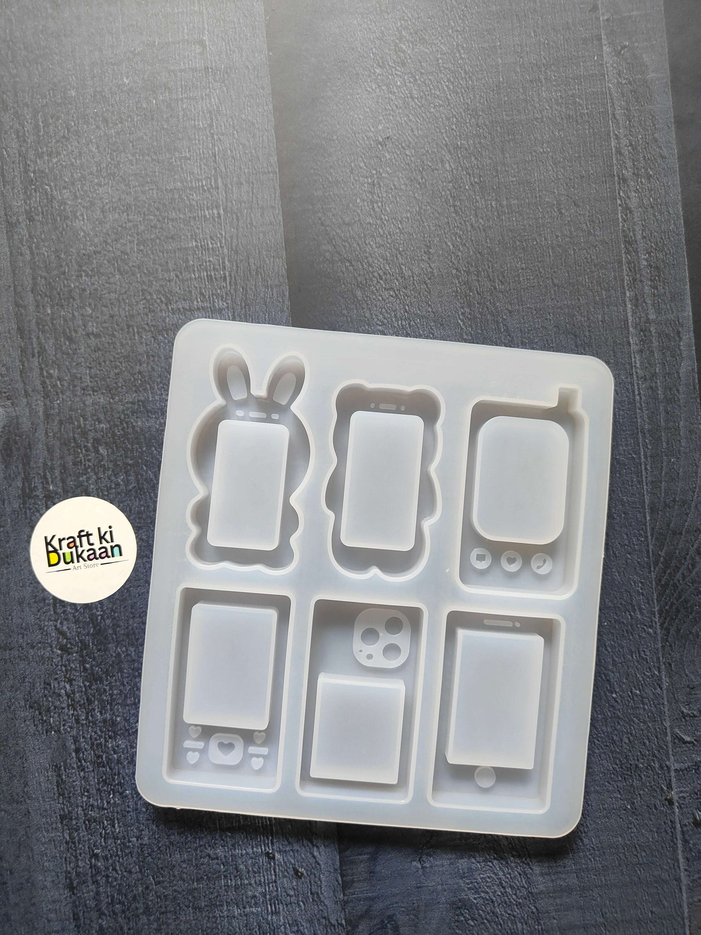 6-cavity mobile phone mould tray with six handset case cavities, white silicone