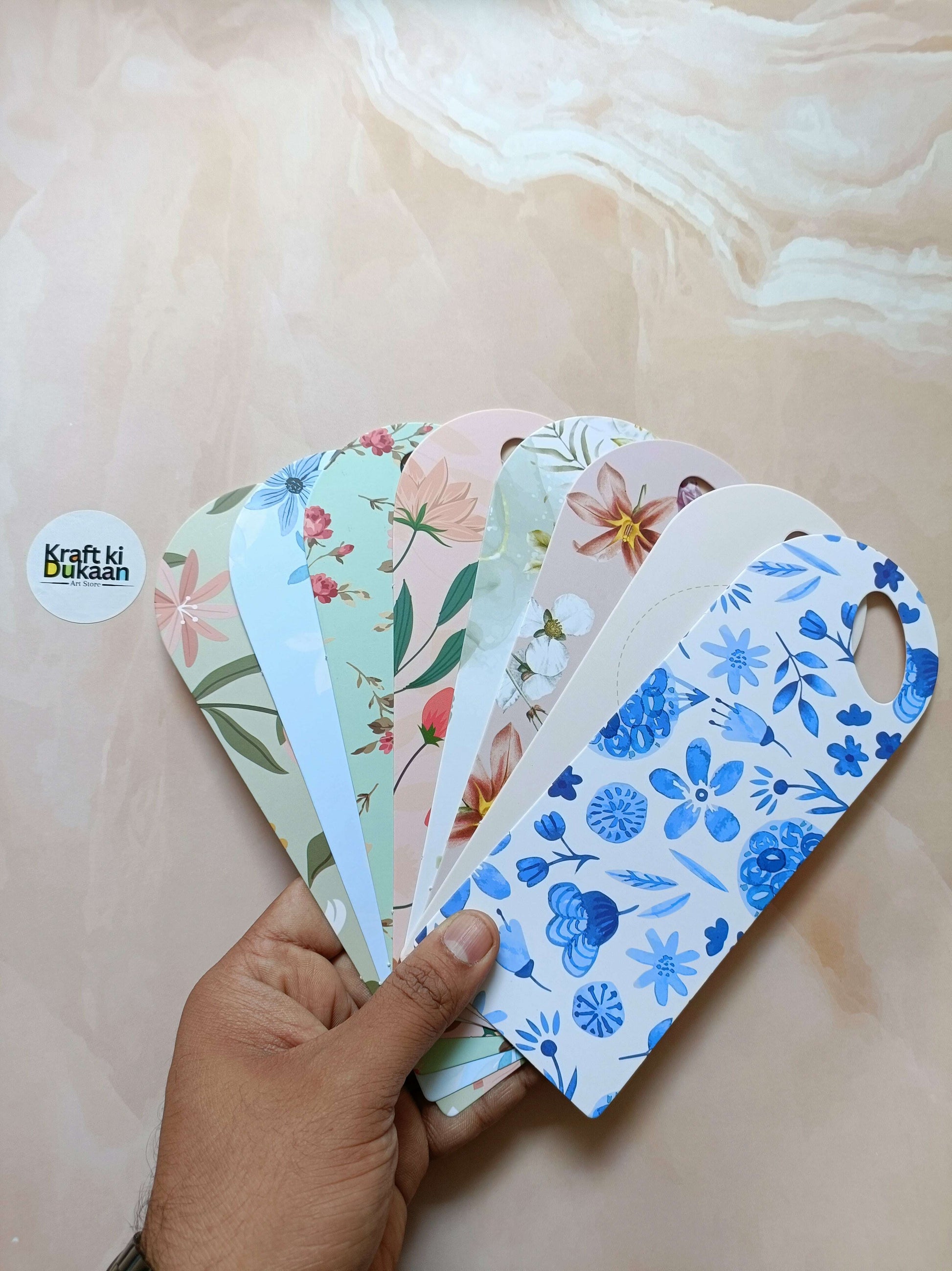 Small floral card holder set with pastel blue, pink, and green leaf patterns