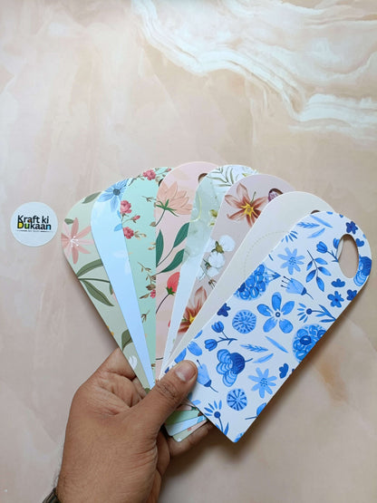 Small floral card holder set with pastel blue, pink, and green leaf patterns