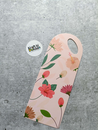 Small floral card holder, light pink background with multicolor flowers and round handle hole