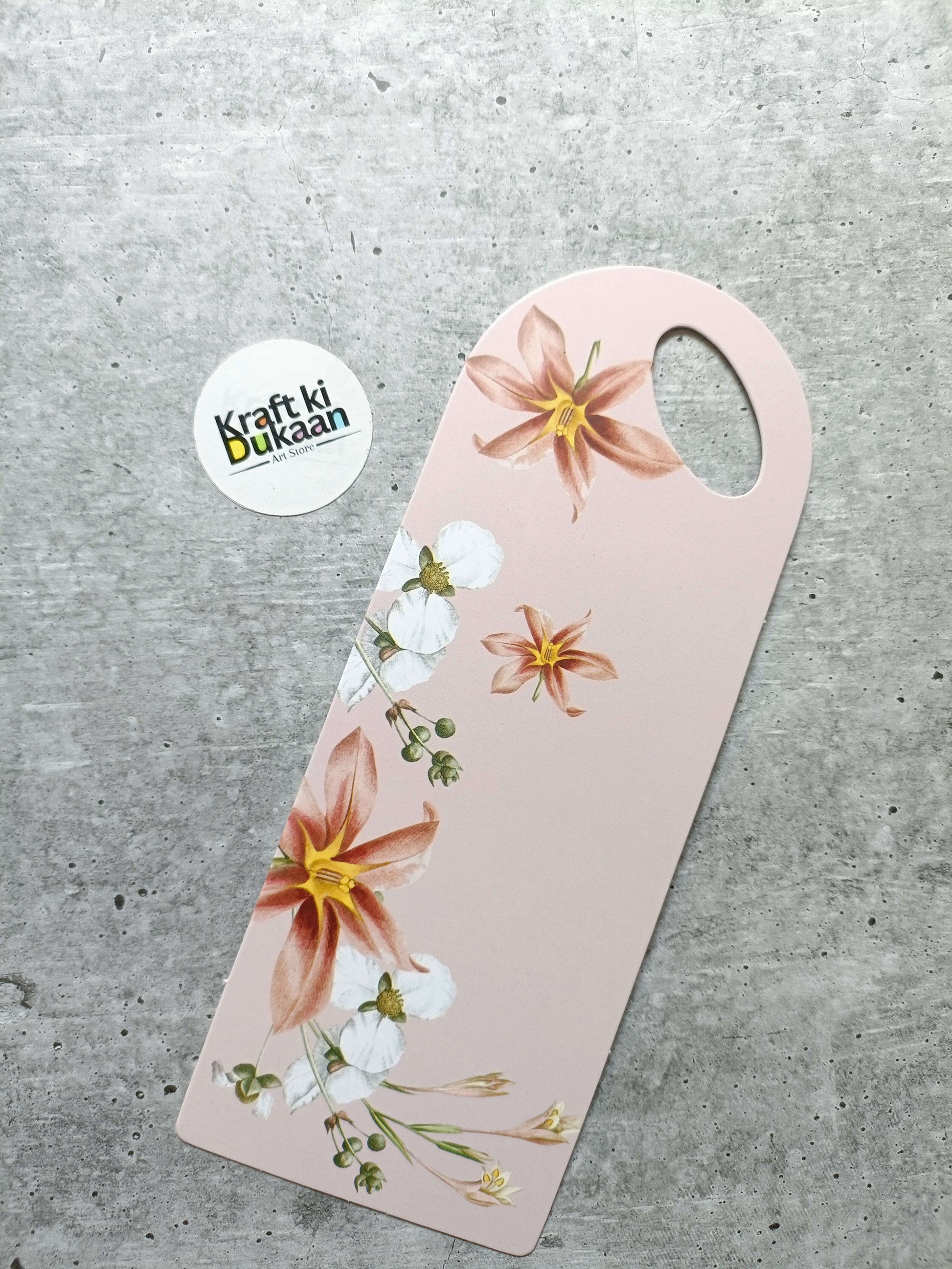 Small floral card holder, pale pink with gold and white flowers and round handle hole