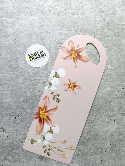 Small floral card holder, pale pink with gold and white flowers and round handle hole